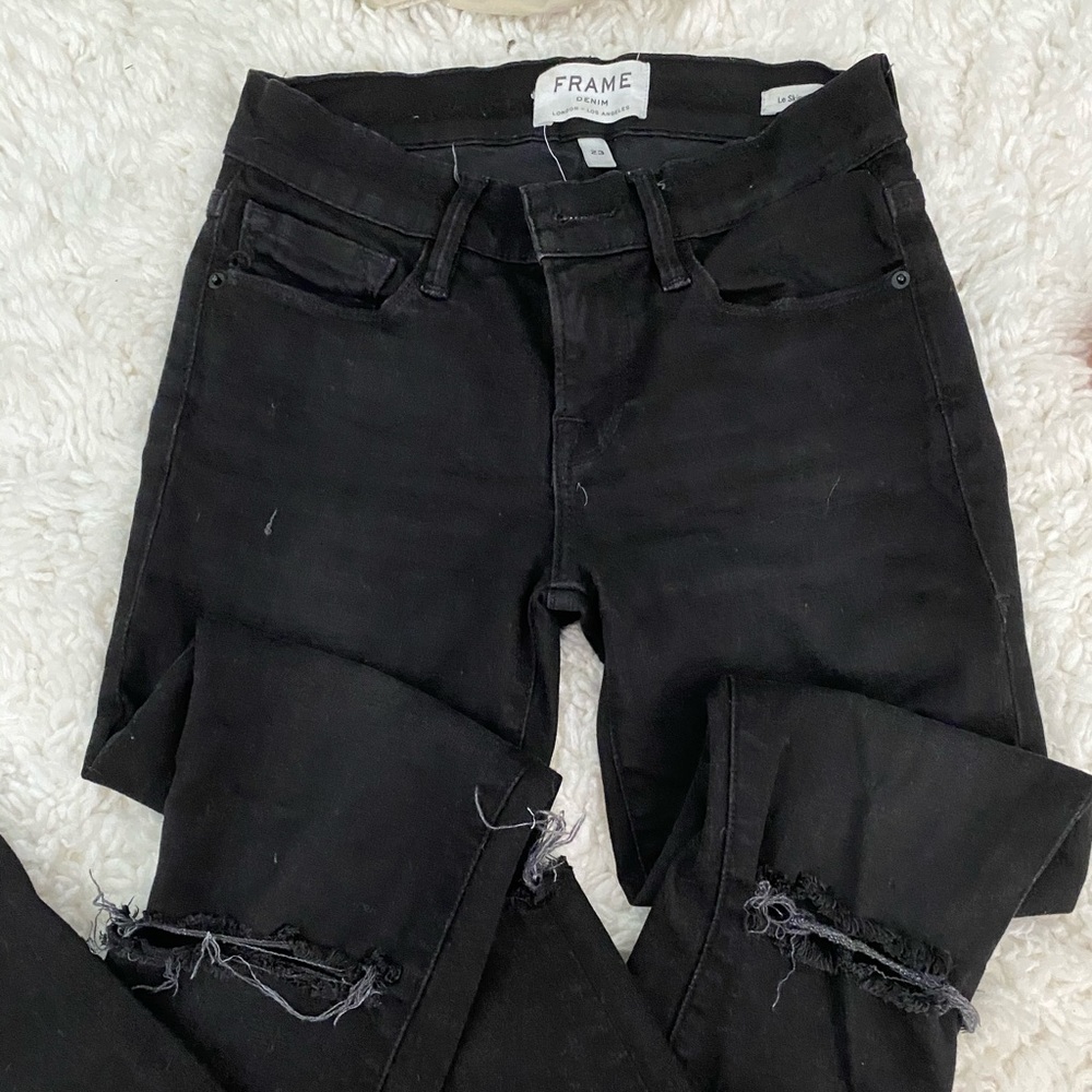 FRAME black distressed jeans